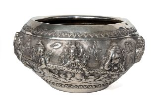 A large Burmese silver bowl, 19th century, repousse decorated with 7 headed snake and figures with