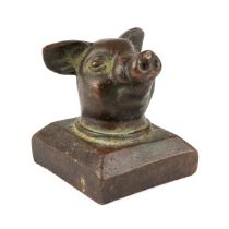 A Chinese bronze desk seal in a form of a pigs head In good condition
