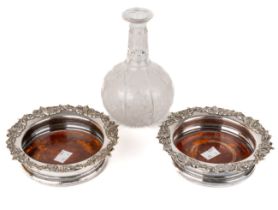 A pair of EPNS bottle coasters, approx. 6.5 inch across the rim together with 19th century