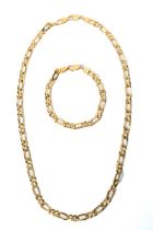 An 18ct yellow gold flat link figaro chain necklace and bracelet, stamped 750, total gross weight
