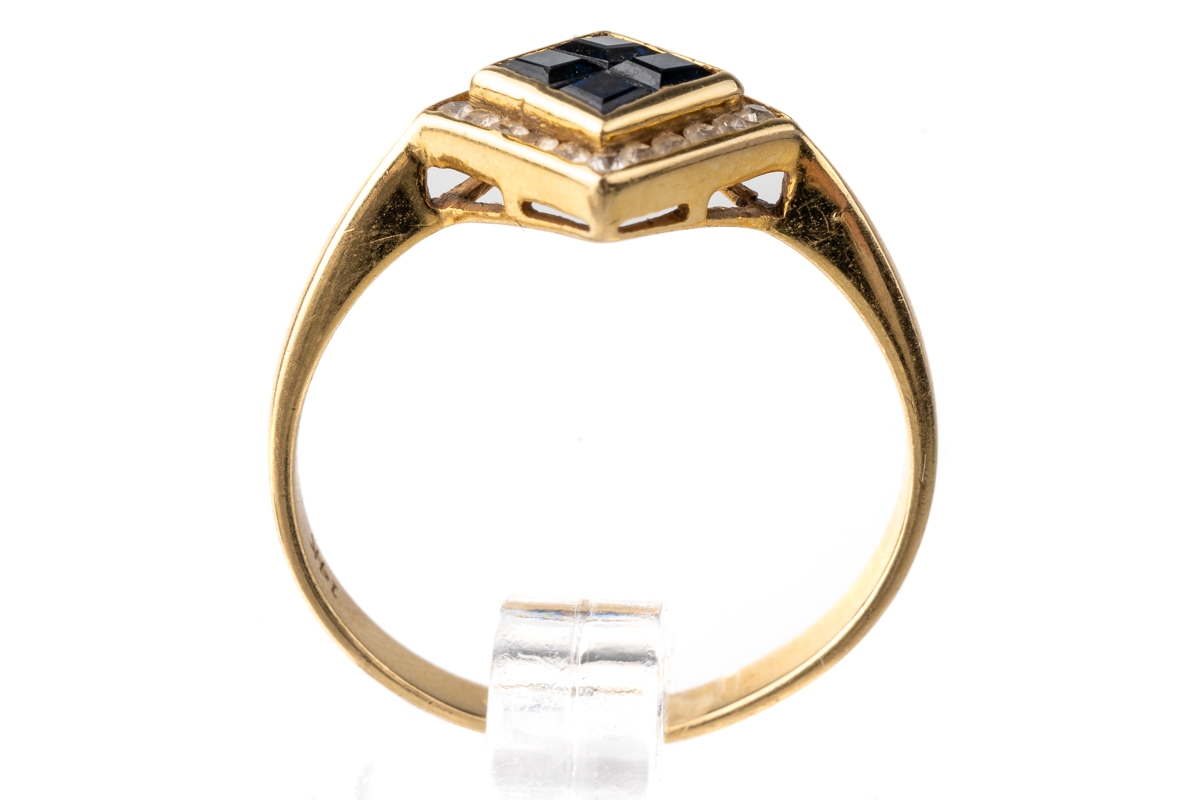 A 14k yellow gold sapphire and diamond ring, set with four square-cut sapphires surrounded by - Image 4 of 5