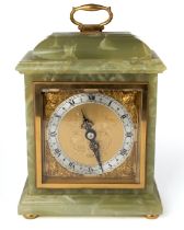 An Elliott of London mantle clock, green onyx body. Approx. 18 cm tall. Currently ticking. No