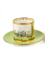 Stefan Nowacki - a Derby pale-green-ground cabinet cup and saucer, painted with a view of