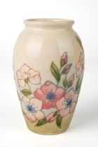 A Moorcroft 'Spring Blossom' vase, designer Sally Tuffin, 1st quality, marked to base, approx 10.5cm