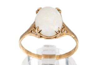 A 9ct yellow gold and opal ring, set with an oval cabochon opal approx 10mm x 8mm, ring size P,