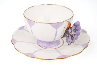 An Aynsley purple butterfly handle cup and saucer, marked to base, Reg No. 765788 Both pieces ring