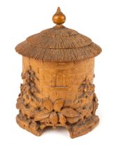 19th century Black Forest velvet lined carved casket in the form of circular stone building, 15 cm