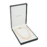 A three-row graduated cultured pearl necklace, with a 9ct yellow gold clasp, approx 42cm long Good