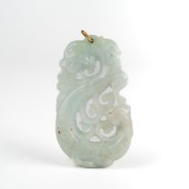 A Chinese carved jade pendant, measures 55mm x 32mm In good condition