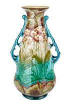 A Mintons Art Nouveau vase, decorated with stylised foliage, 30 cm high, marks to base Some