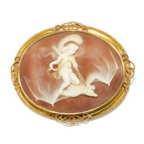 A mid-19th century oval cameo brooch depicting Ariel, riding on a bat with a feather, mounted in a