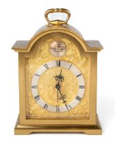 A Swiza mantle clock, 15 Jewel, solid brass. Approx. 16 cm tall. Currently ticking. No warranty