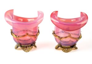 A pair of Victorian pink and green vaseline glass vases, approx 14.5cm high Good condition, wear