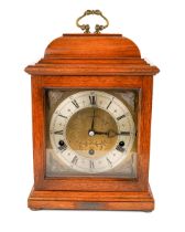 An Elliott eight-day Westminster chime bracket clock, in walnut case, having platform escapement