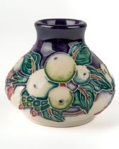 A Moorcroft 'Snow Berry' miniature squat vase, designer Nicola Slaney, 1st quality, dated 2002,