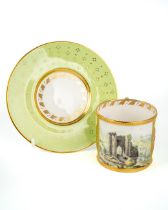 Stefan Nowacki - a Derby pale-green-ground cabinet cup and saucer, painted with a view of Neath