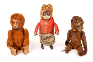 3 antique Schucko monkey toys to include a mechanical drummer (no key), a yes/no monkey and a