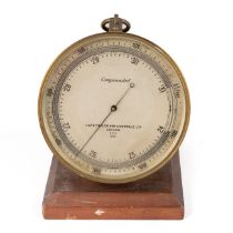 WW2 era compensated aneroid barometer by TA Renolds.son and Wardale LTD, dated to dial 1939 on a