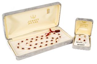 Jersey Pearl - A 9ct gold pearl and garnet necklace and earring set, the 46cm long necklace with