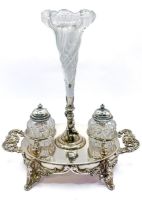 A Victorian Britannia metal ink standish, cherub centrepiece supporting a writhen glass vase, two