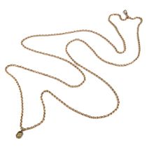 A 9ct yellow gold guard chain, approx 80cm long, with a base metal and paste charm, total gross