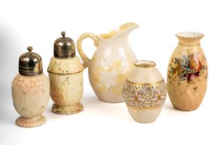 A yellow Belleek jug; a Grainger Worcester pierced vase; a Royal Worcester blush ivory vase and