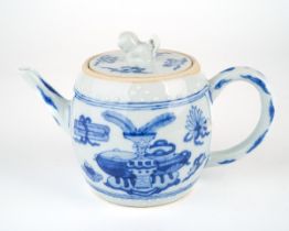 A Chinese blue and white teapot and cover, dog of foe finial, painted with vases, scrolls,