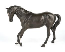 A Beswick black horse, approx 24.5cm long In good undamaged condition