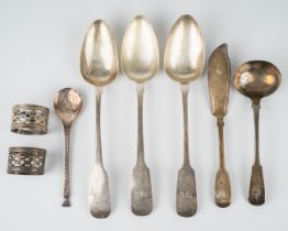 Three 18th Century Irish silver fiddle pattern table spoons with rat tails, engraved with