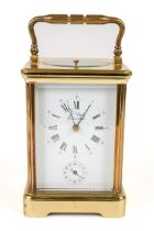 A brass L'Epee repeating carriage clock, with alarm, original key, approx 14cm high without handle