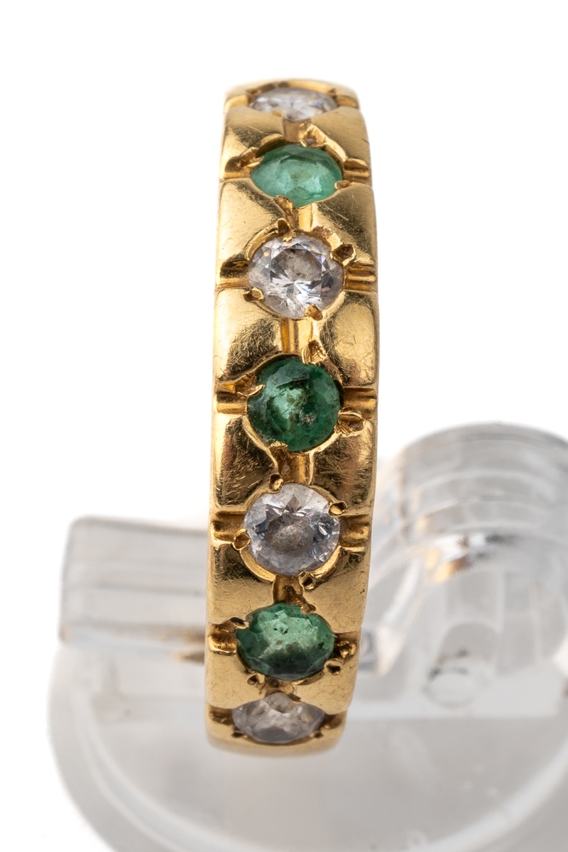 A yellow metal and emerald cross pendant, set with round-cut emeralds in claw settings, unmarked - Image 5 of 5