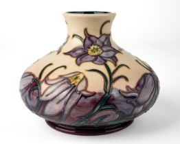 A Moorcroft 'Pasque Flower' squat vase, designer Philip Gibson, silver line, dated 2000, signed
