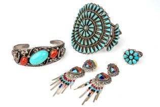 A collection of vintage silver Navajo turquoise set jewellery, to include two bangles, a pair of