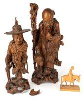 Two Chinese carved hardwood Okimonos and a figure on a donkey (3). Tallest 41 cm tall Large figure -