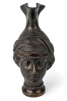 Grand Tour bronze wine ever after the antique, in the form of the head of a Roman lady, approx. 23