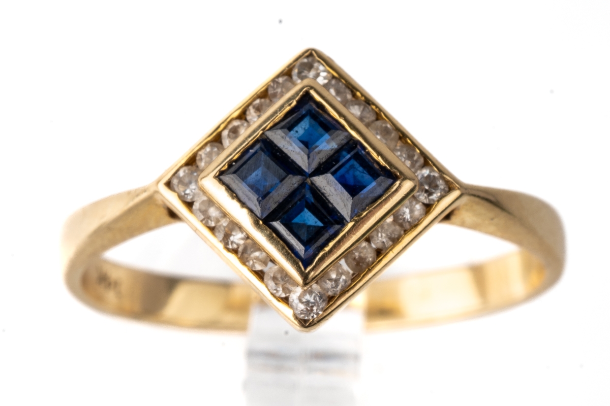 A 14k yellow gold sapphire and diamond ring, set with four square-cut sapphires surrounded by - Image 2 of 5