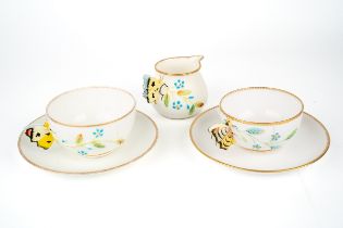Two Coapland China cups and saucers, butterfly handles, together with a cream jug, marked to base,