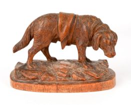 Black forest carved wooden dog, possibly Brienze, 9 cm tall and 14 cm long. Tail has been broken and