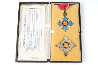 Boxed KBE Knight commander of the British Empire to include enamelled medal and breast badge. See