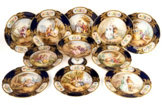 A Sevres porcelain dessert service, mid 19th century, of lobed circular form, centrally painted in