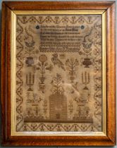 A Georgian needlework sampler. Dated 1825 by Letishea Clark age 12. In antique maple frame. Frame