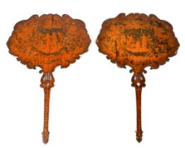 A pair of regency Penwork wooden face screens, one with chinoiserie decoration the other with a