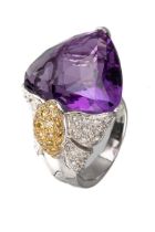An 18ct white gold diamond and amethyst dress ring, set with a large faceted heart shaped