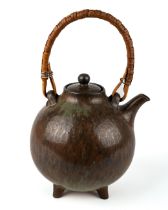 A rare Gunnar Nylund for Rostrand 1960s fur glazed teapot, with wicker handle, total height