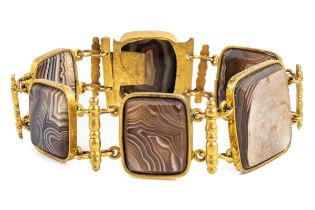 A 19th century gilt metal and agate bracelet, set with six rectangular polished agate panels, approx