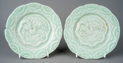 Two 19th Century Chinese celadon dragon plates, approx 16cm diam (2)