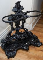 A large Coalbrookedale style cast hall stand, 72cm high x 70cm wide painted black