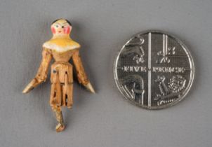 A 19th Century Peg Doll, in fitted case, approx 2.5cm long lower left leg missing