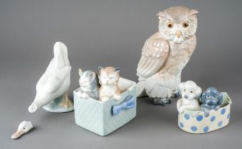 A group of four Nao figures to include: Puppies in basket no: 1082; Cats in a box, no: 1080; Owl no: