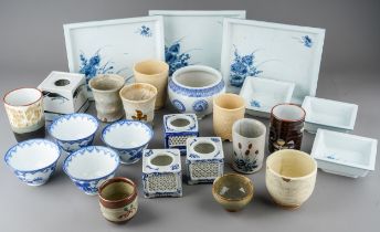 A collection of 19th and 20th century Chinese and Japanese porcelain to include trays, incense